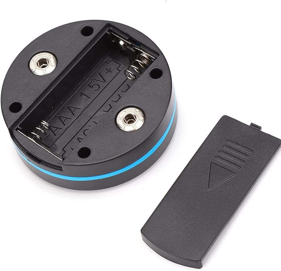 Portable mini neck and body massager battery compartment with cover removed showing AAA battery slot