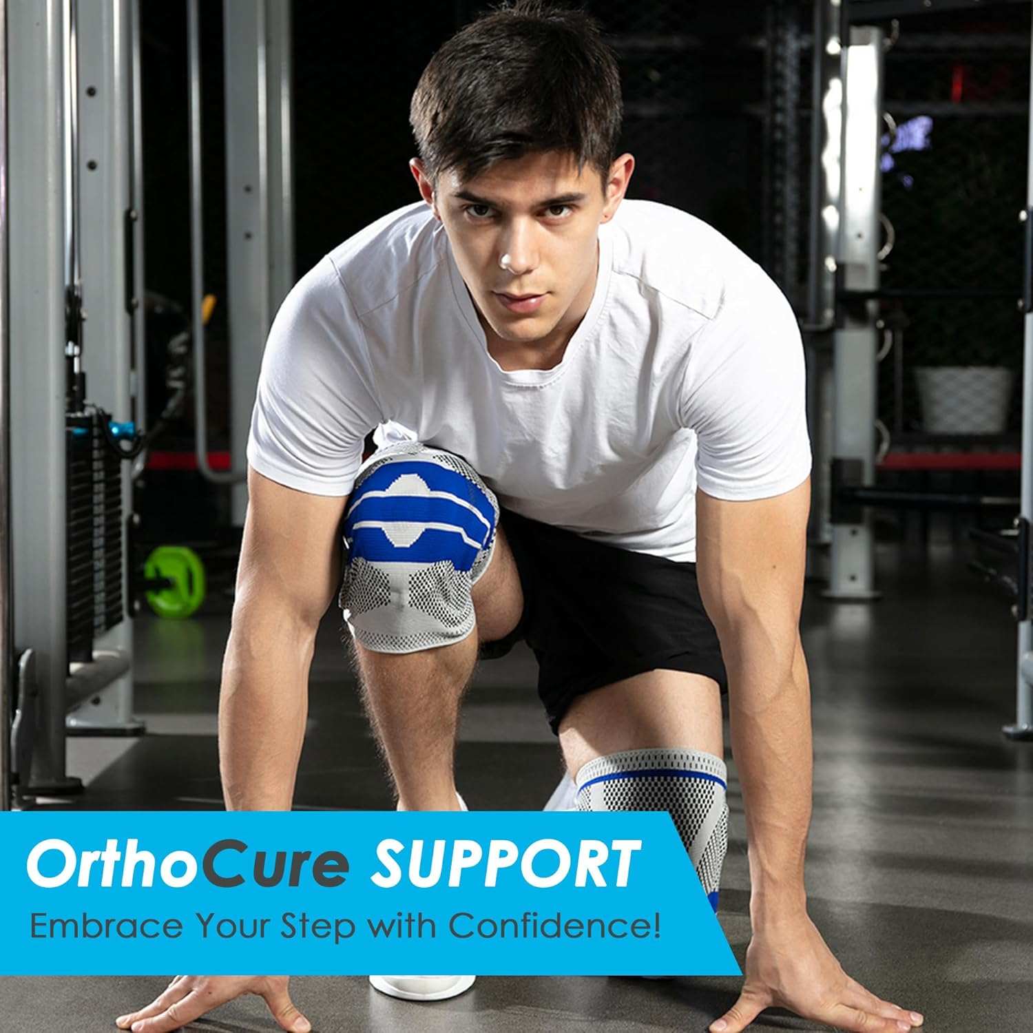 Young man wearing knee brace with patella gel pad and side stabilizers in gym workout position