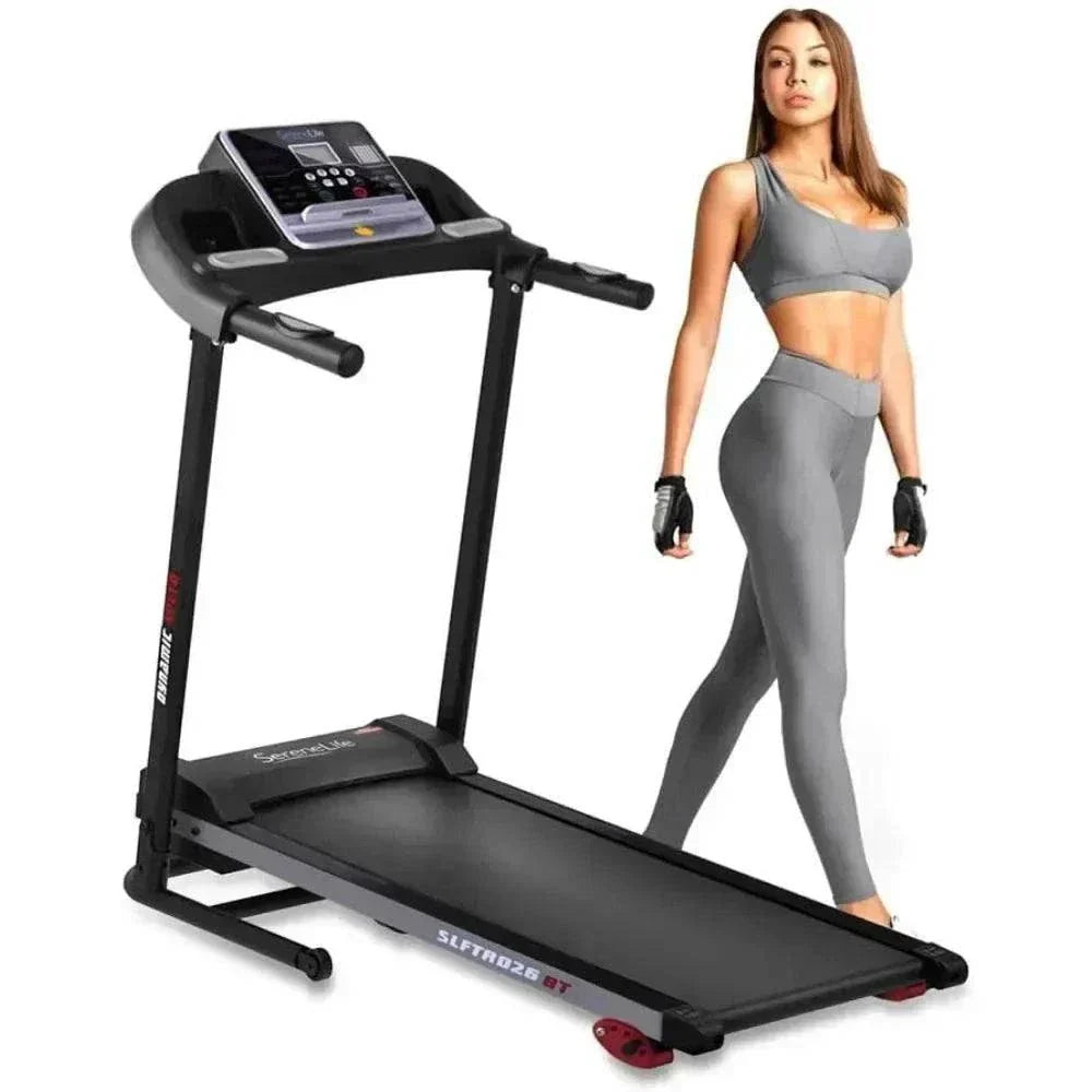 folding electric treadmill with lcd display and bluetooth connectivity shown with a woman in gray workout attire standing beside it for home fitness workouts
