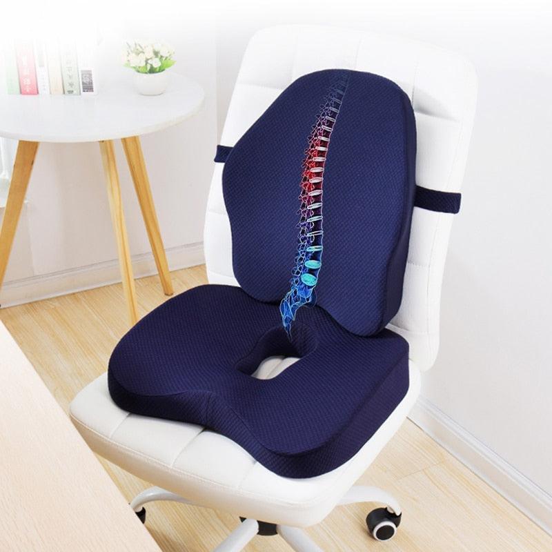 Orthopedic seat cushion with memory foam and lumbar support on white office chair