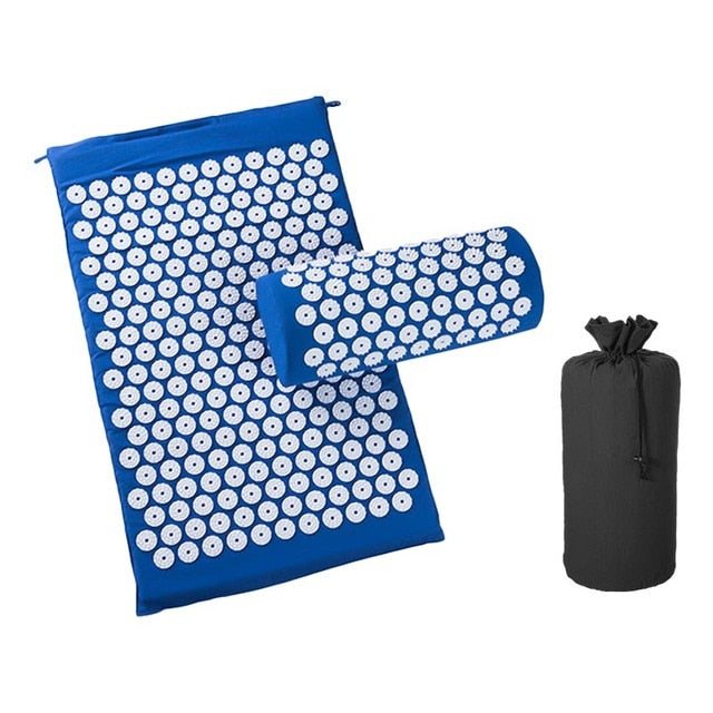 Blue acupressure cushion and mat set with white plastic spikes and black carry bag for natural pain relief and muscle relaxation