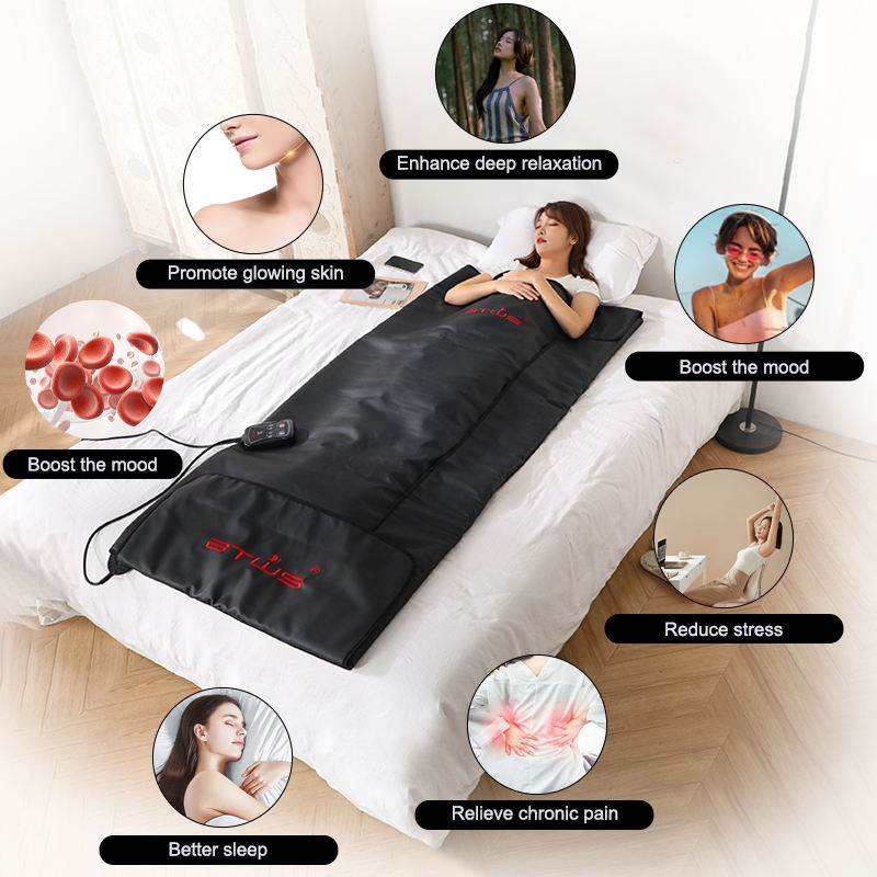 Portable infrared sauna blanket on bed for deep relaxation, weight loss, detox, glowing skin, stress reduction, and pain relief