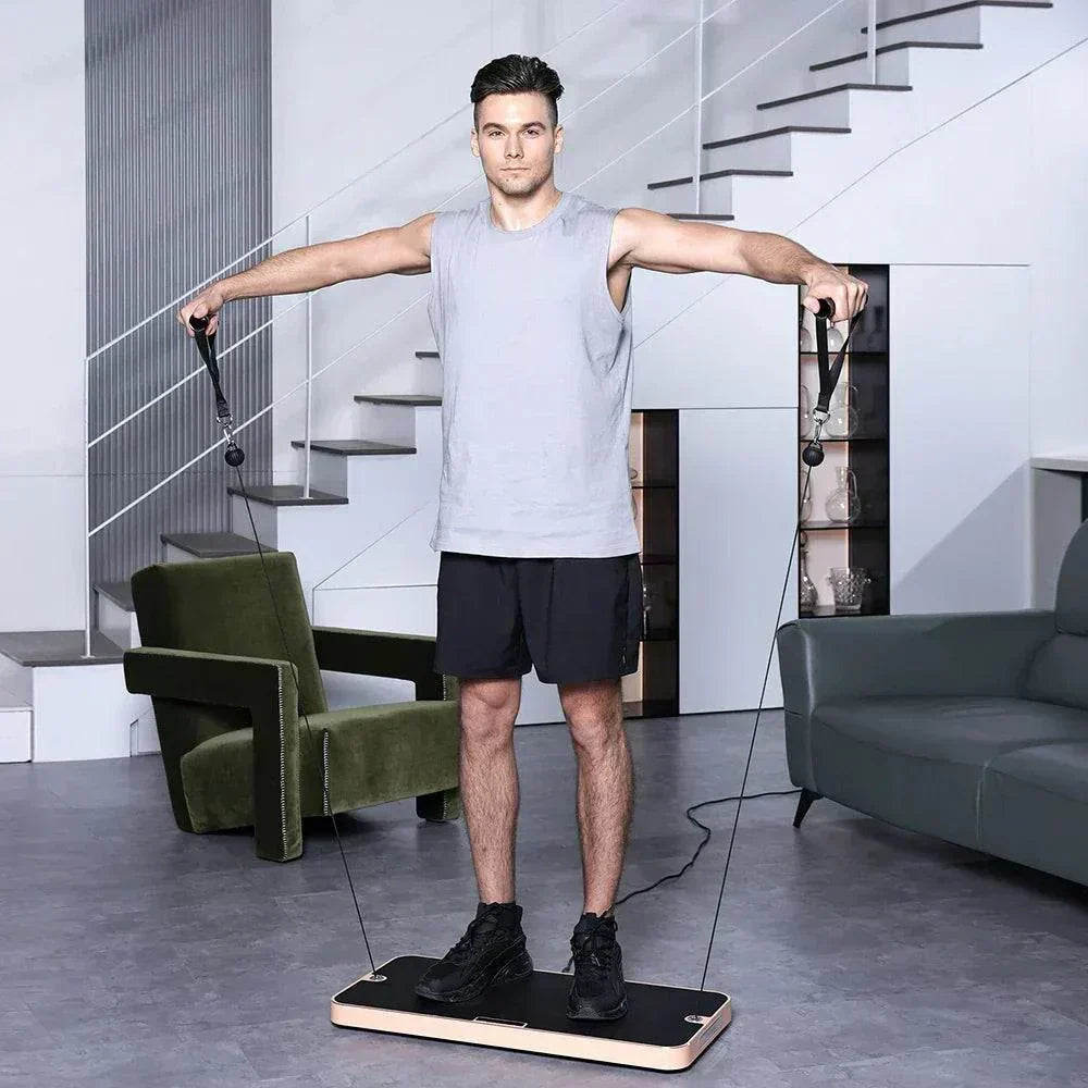 Man using Smart All In One Home Fitness exercise training gym with resistance bands in living room
